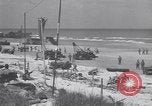 Image of Equipment and reinforcements landing in invasion of France Normandy France, 1944, second 33 stock footage video 65675038225