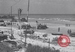 Image of Equipment and reinforcements landing in invasion of France Normandy France, 1944, second 34 stock footage video 65675038225