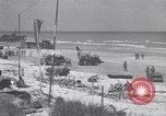 Image of Equipment and reinforcements landing in invasion of France Normandy France, 1944, second 35 stock footage video 65675038225