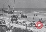 Image of Equipment and reinforcements landing in invasion of France Normandy France, 1944, second 36 stock footage video 65675038225
