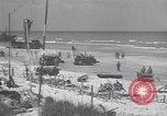 Image of Equipment and reinforcements landing in invasion of France Normandy France, 1944, second 37 stock footage video 65675038225
