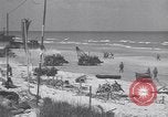 Image of Equipment and reinforcements landing in invasion of France Normandy France, 1944, second 39 stock footage video 65675038225
