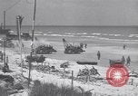 Image of Equipment and reinforcements landing in invasion of France Normandy France, 1944, second 40 stock footage video 65675038225