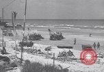 Image of Equipment and reinforcements landing in invasion of France Normandy France, 1944, second 41 stock footage video 65675038225