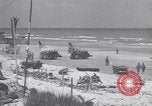 Image of Equipment and reinforcements landing in invasion of France Normandy France, 1944, second 43 stock footage video 65675038225