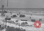 Image of Equipment and reinforcements landing in invasion of France Normandy France, 1944, second 44 stock footage video 65675038225