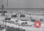 Image of Equipment and reinforcements landing in invasion of France Normandy France, 1944, second 45 stock footage video 65675038225