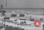 Image of Equipment and reinforcements landing in invasion of France Normandy France, 1944, second 46 stock footage video 65675038225