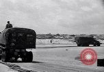 Image of Equipment and reinforcements landing in invasion of France Normandy France, 1944, second 54 stock footage video 65675038225