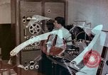 Image of Steps in production of a vinyl phonograph record Indianapolis Indiana USA, 1956, second 1 stock footage video 65675038229