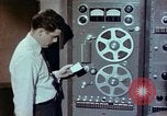 Image of Steps in production of a vinyl phonograph record Indianapolis Indiana USA, 1956, second 41 stock footage video 65675038229