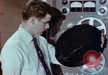 Image of Steps in production of a vinyl phonograph record Indianapolis Indiana USA, 1956, second 49 stock footage video 65675038229