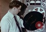 Image of Steps in production of a vinyl phonograph record Indianapolis Indiana USA, 1956, second 52 stock footage video 65675038229