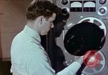 Image of Steps in production of a vinyl phonograph record Indianapolis Indiana USA, 1956, second 55 stock footage video 65675038229
