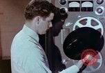 Image of Steps in production of a vinyl phonograph record Indianapolis Indiana USA, 1956, second 62 stock footage video 65675038229