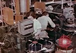 Image of production and packaging of vinyl phonograph records United States USA, 1956, second 4 stock footage video 65675038230