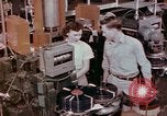 Image of production and packaging of vinyl phonograph records United States USA, 1956, second 8 stock footage video 65675038230