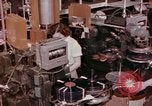 Image of production and packaging of vinyl phonograph records United States USA, 1956, second 10 stock footage video 65675038230