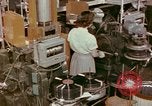 Image of production and packaging of vinyl phonograph records United States USA, 1956, second 51 stock footage video 65675038230