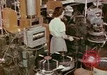 Image of production and packaging of vinyl phonograph records United States USA, 1956, second 54 stock footage video 65675038230