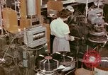 Image of production and packaging of vinyl phonograph records United States USA, 1956, second 56 stock footage video 65675038230