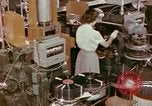 Image of production and packaging of vinyl phonograph records United States USA, 1956, second 59 stock footage video 65675038230