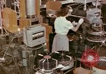 Image of production and packaging of vinyl phonograph records United States USA, 1956, second 60 stock footage video 65675038230