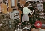 Image of production and packaging of vinyl phonograph records United States USA, 1956, second 61 stock footage video 65675038230