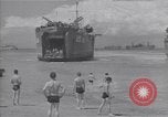 Standbild amerikanische Matrosen schwimmen Normandie Frankreich, 1944, aus Sekunde 58 historischem Filmmaterial Videoclip 65675038272