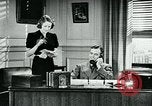 Immagine di Abitudini di telefono United States USA, 1940, secondo 25 filmato di repertorio 65675038315