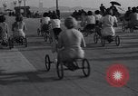 Image of hobby horse race Santa Monica California USA, 1934, second 25 stock footage video 65675038344