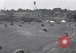 Standbild Weizen Feld in der Nähe von Factory United States USA, 1917, aus Sekunde 19 historischem Filmmaterial Videoclip 65675038397