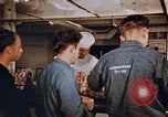 Standbild Matrosen Essen an Bord der USS Boxer Korea, 1953, aus Sekunde 7 historischem Filmmaterial Videoclip 65675038544