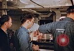 Standbild Matrosen Essen an Bord der USS Boxer Korea, 1953, aus Sekunde 11 historischem Filmmaterial Videoclip 65675038544