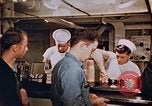 Standbild Matrosen Essen an Bord der USS Boxer Korea, 1953, aus Sekunde 13 historischem Filmmaterial Videoclip 65675038544