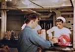 Standbild Matrosen Essen an Bord der USS Boxer Korea, 1953, aus Sekunde 26 historischem Filmmaterial Videoclip 65675038544