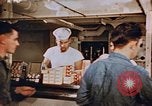 Standbild Matrosen Essen an Bord der USS Boxer Korea, 1953, aus Sekunde 27 historischem Filmmaterial Videoclip 65675038544