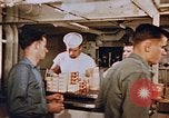 Standbild Matrosen Essen an Bord der USS Boxer Korea, 1953, aus Sekunde 29 historischem Filmmaterial Videoclip 65675038544