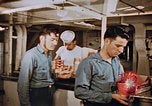 Standbild Matrosen Essen an Bord der USS Boxer Korea, 1953, aus Sekunde 33 historischem Filmmaterial Videoclip 65675038544