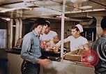Standbild Matrosen Essen an Bord der USS Boxer Korea, 1953, aus Sekunde 35 historischem Filmmaterial Videoclip 65675038544