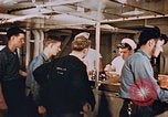 Standbild Matrosen Essen an Bord der USS Boxer Korea, 1953, aus Sekunde 42 historischem Filmmaterial Videoclip 65675038544