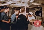 Standbild Matrosen Essen an Bord der USS Boxer Korea, 1953, aus Sekunde 54 historischem Filmmaterial Videoclip 65675038544