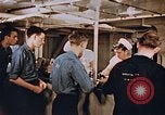 Standbild Matrosen Essen an Bord der USS Boxer Korea, 1953, aus Sekunde 59 historischem Filmmaterial Videoclip 65675038544