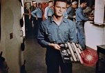 Image of bomb loading on USS Boxer Korea, 1953, second 4 stock footage video 65675038545