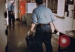 Image of bomb loading on USS Boxer Korea, 1953, second 9 stock footage video 65675038545