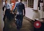 Image of bomb loading on USS Boxer Korea, 1953, second 22 stock footage video 65675038545
