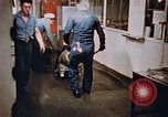 Image of bomb loading on USS Boxer Korea, 1953, second 23 stock footage video 65675038545