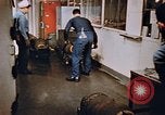 Image of bomb loading on USS Boxer Korea, 1953, second 26 stock footage video 65675038545