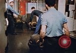 Image of bomb loading on USS Boxer Korea, 1953, second 27 stock footage video 65675038545