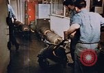 Image of bomb loading on USS Boxer Korea, 1953, second 38 stock footage video 65675038545